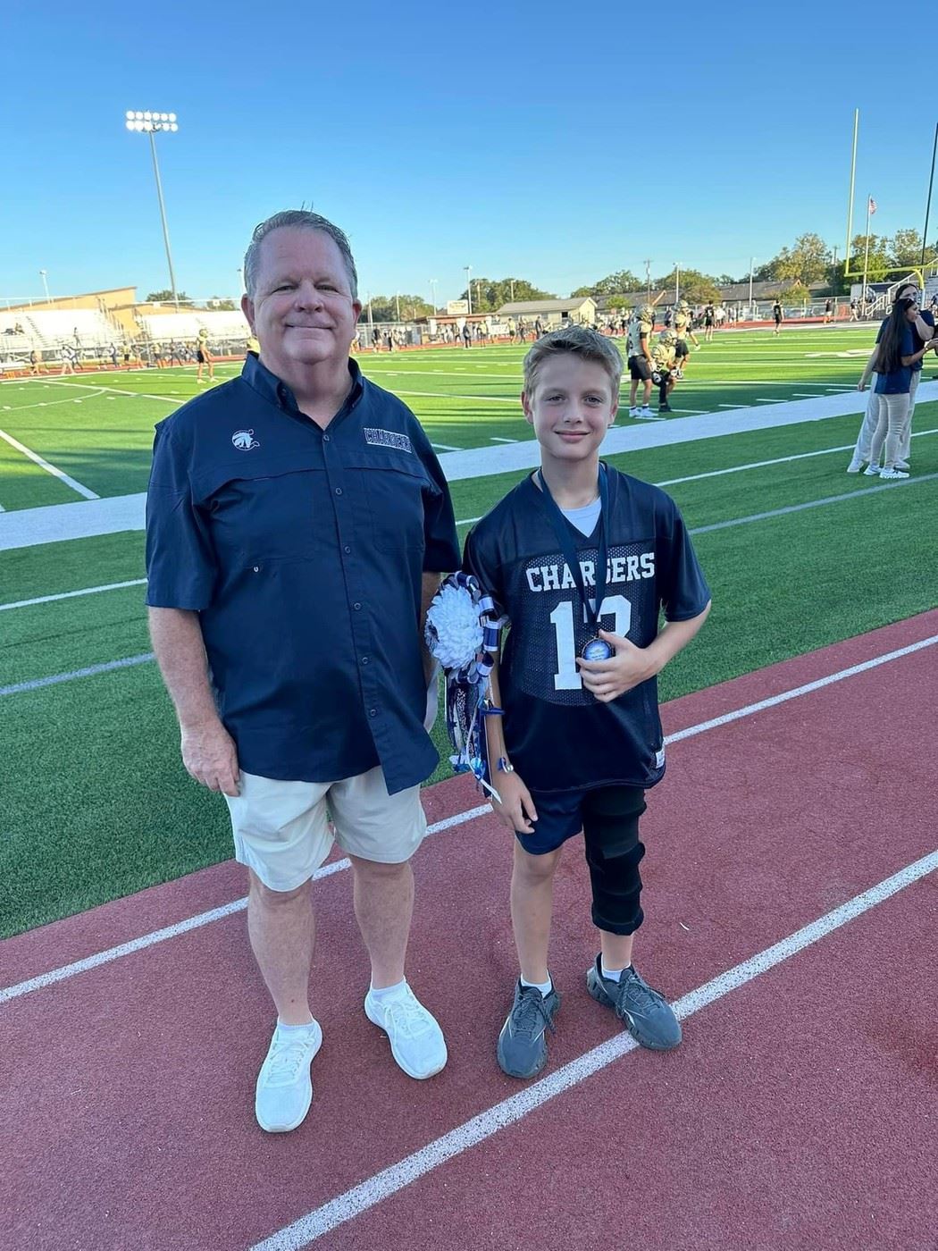  Student smiling on field